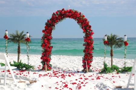 Barefoot Bed of Roses wedding arch Barefoot Beach Weddings in Destin 
